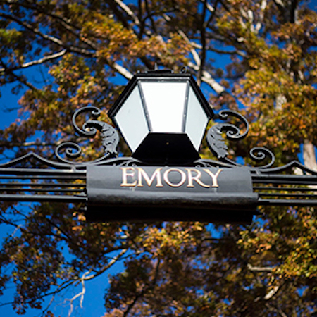 Lantern atop "Emory" sign on wrought iron gate