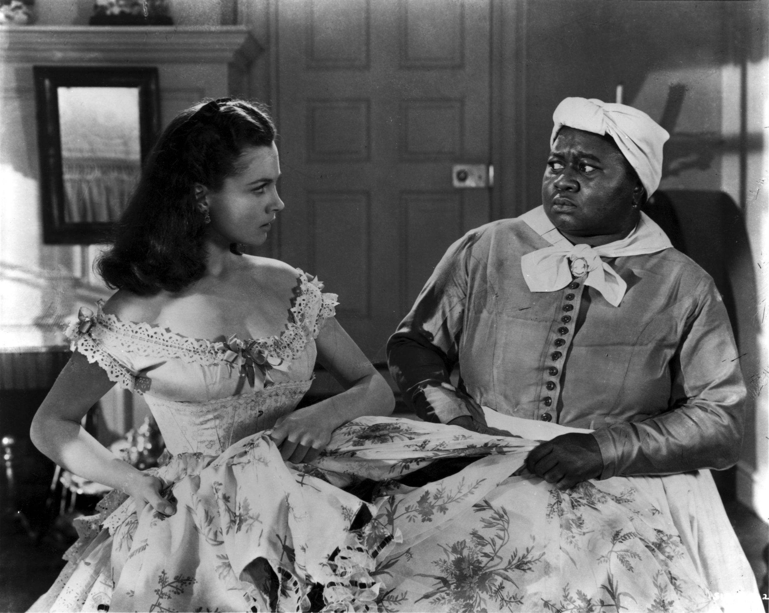 Black and white still image from "Gone with the Wind" featuring Scarlett O'Hara and Mammy
